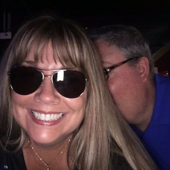 Cannon Creek Vineyard - a woman in sunglasses and a man in a blue shirt - Wine Tasting Room Near Me - Canton, Texas Cannon Creek Vineyard - a woman in sunglasses and a man in a blue shirt - Wine Tasting Room Near Me - Canton, Texas