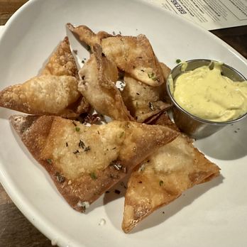 The Hen & The Hog - Minnesota Wontons: pickle, pastrami & cream cheese wontons served with dill mustard aioli - New American Near Me - Albertville, Minnesota The Hen & The Hog - Minnesota Wontons: pickle, pastrami & cream cheese wontons served with dill mustard aioli - New American Near Me - Albertville, Minnesota