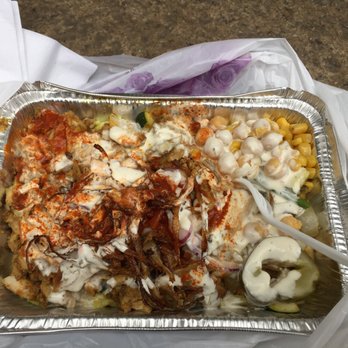 Gyrohouse NYC - a tray of food on a table - Halal Near Me - New York, New York Gyrohouse NYC - a tray of food on a table - Halal Near Me - New York, New York