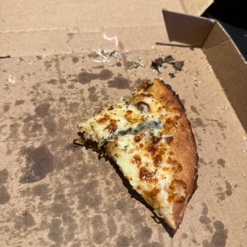 Oath Pizza - Poulsbo - What's left of my garlic bread. Fresh roasted garlic on top. - Pizza Near Me - Poulsbo, Washington Oath Pizza - Poulsbo - What's left of my garlic bread. Fresh roasted garlic on top. - Pizza Near Me - Poulsbo, Washington