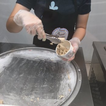Sweet Creams - Filling the cup with the ice cream rolls. - Ice Cream & Frozen Yogurt Near Me - Honolulu, Hawaii Sweet Creams - Filling the cup with the ice cream rolls. - Ice Cream & Frozen Yogurt Near Me - Honolulu, Hawaii