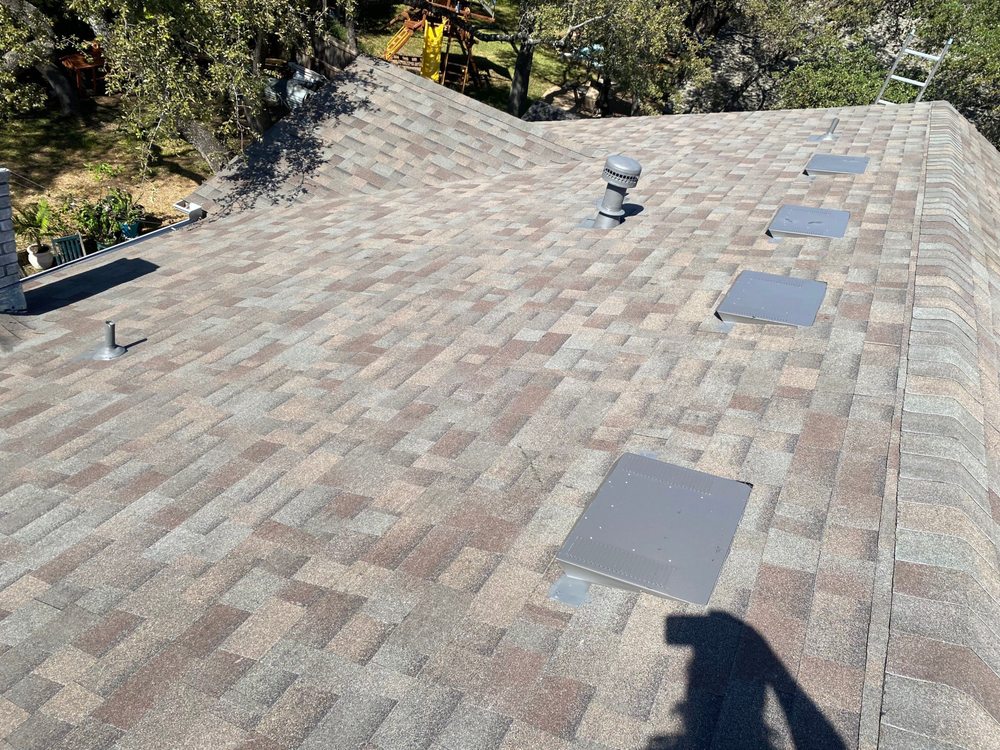 Slide of Texan Roofing Pro