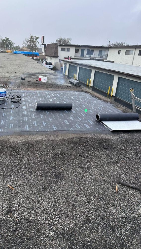 Slide of Tecun’s Roofing