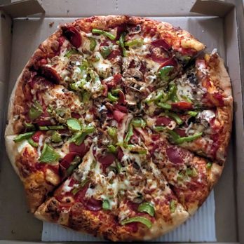 Regino's Pizza - Large three-topping pizza. It's got pepperoni, mushrooms, and green peppers. - Pizza Near Me - Markham, Ontario