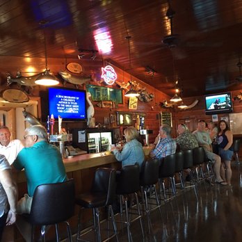 Sunset on Rileys Point - people sitting at the bar - Pizza Near Me - Sturgeon Bay, Wisconsin