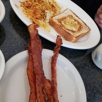 Toast - Egg in a basket + hashbrowns and bacon - Breakfast & Brunch Near Me - New Port Richey, Florida Toast - Egg in a basket + hashbrowns and bacon - Breakfast & Brunch Near Me - New Port Richey, Florida
