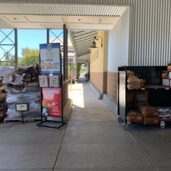 Smart & Final Extra! - Firewood and charcoal outside the entrance. - Grocery Near Me - Paso Robles, California