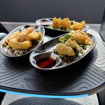 Shinjuku Station - Apps brought table-side by the automated robot server - Conveyor Belt Sushi Near Me - High Point, North Carolina Shinjuku Station - Apps brought table-side by the automated robot server - Conveyor Belt Sushi Near Me - High Point, North Carolina