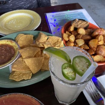 Cha Cha Cha - Potatoes with spicy romesco sauce and chips salsa and jalapeño margaritas - Caribbean Near Me - San Francisco, California Cha Cha Cha - Potatoes with spicy romesco sauce and chips salsa and jalapeño margaritas - Caribbean Near Me - San Francisco, California
