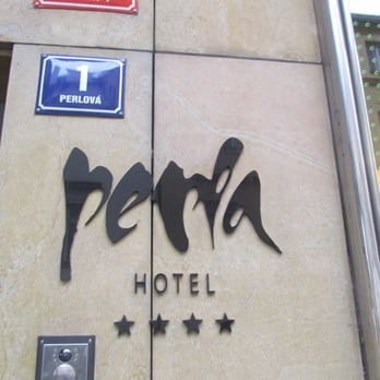 Perla Hotel - Hotel sign. - Hotels Near Me