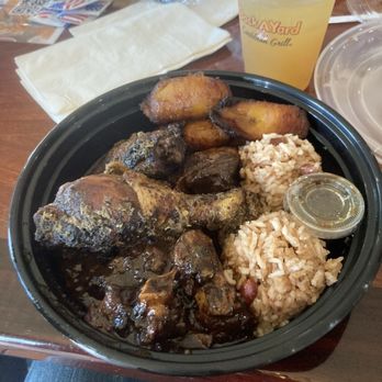 Back A Yard Caribbean Grill - Ox tail , rice jerked chicken and plantains,and spicy sauce. - Caribbean Near Me - Campbell, California