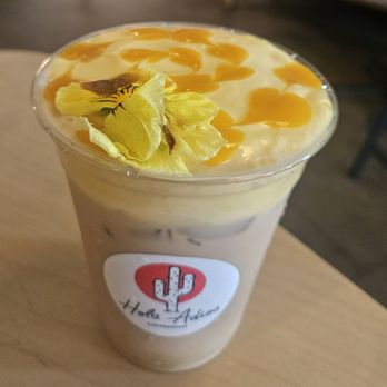Hola Adios Coffeeshop - Summer Menu:  Mango Sticky Rice Iced Latte ($9.50) + Oat Milk ($1) - Coffee & Tea Near Me - Tustin, California