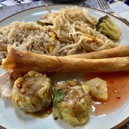 Pineapple fried rice, veggie pad Thai, spring rolls, and dumplings. Yummy! Pineapple fried rice, veggie pad Thai, spring rolls, and dumplings. Yummy!