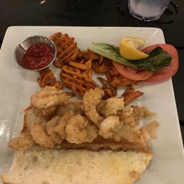 Basic terrible excuse for a shrimpnpoboy was not good bread was hard fries sucked just low food quality Basic terrible excuse for a shrimpnpoboy was not good bread was hard fries sucked just low food quality
