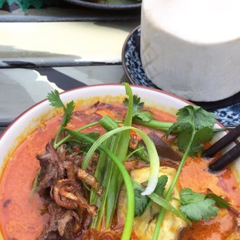 Reckless Noodle House - Curry vermicelli bowl $14 and a fresh coconut water $6. - Bars Near Me - Seattle, Washington Reckless Noodle House - Curry vermicelli bowl $14 and a fresh coconut water $6. - Bars Near Me - Seattle, Washington