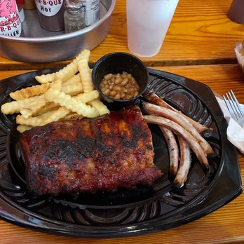 Bubbalou's Bodacious Bar B Que - Baby back dinner. Partially eaten. Couldn't help myself, it's so good - Caterers Near Me - Orlando, Florida