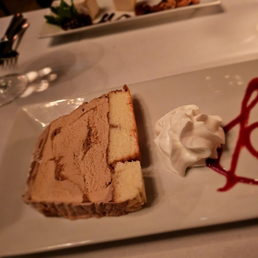 Chez Josephine - Bombe Glaceé Praline. $15. Thin but tasty. Good ice cream flavor in particular - French Near Me - New York, New York