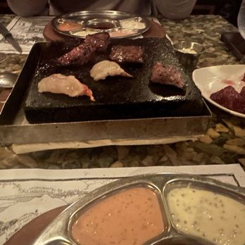 Grizzly House - Meat and lobster cooking - Fondue Near Me - Banff, Alberta