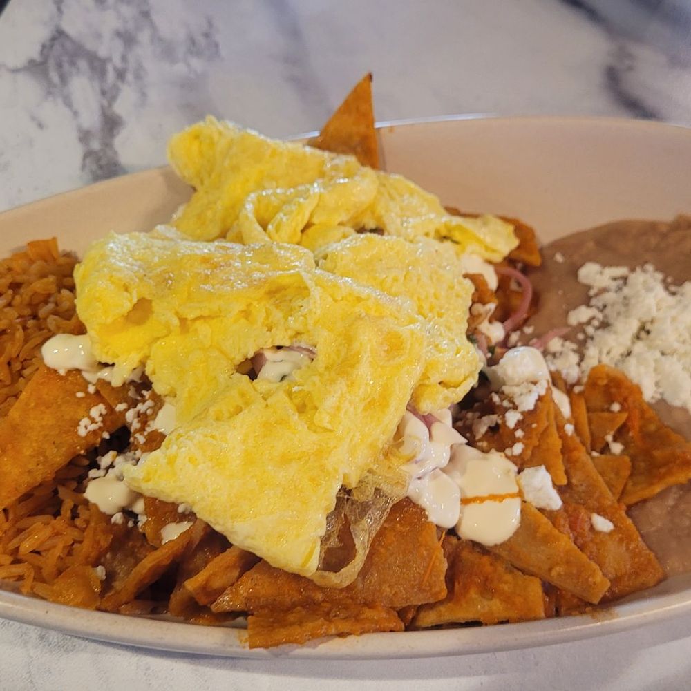 Haven Haus Cafe - Chilaquiles plate... MEH! Basically, chips in salsa with some bag rice. - Breakfast & Brunch Near Me - Temecula, California Haven Haus Cafe - Chilaquiles plate... MEH! Basically, chips in salsa with some bag rice. - Breakfast & Brunch Near Me - Temecula, California