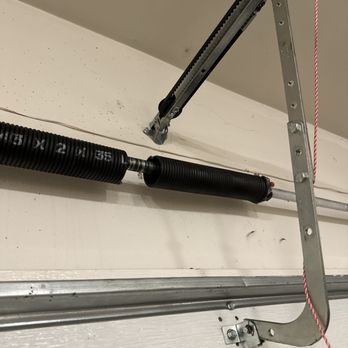 Dave’s Door Service - Broken springs - Garage Door Services Near Me