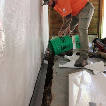 Dbs - Our team installing a perimeter drainage system for a drier, healthier basement. - Foundation Repair Near Me - Eden Prairie, Minnesota Dbs - Our team installing a perimeter drainage system for a drier, healthier basement. - Foundation Repair Near Me - Eden Prairie, Minnesota