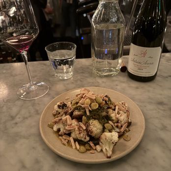 Pearl - Roasted cauliflower with black tahini. almonds and raisins - Italian Near Me - San Francisco, California Pearl - Roasted cauliflower with black tahini. almonds and raisins - Italian Near Me - San Francisco, California