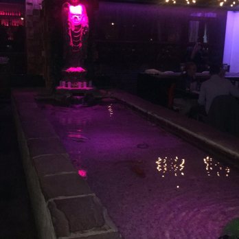 Jade Eatery And Lounge - Beautiful Buddha statue with the pond that has Koi fish - Asian Fusion Near Me - Forest Hills, New York Jade Eatery And Lounge - Beautiful Buddha statue with the pond that has Koi fish - Asian Fusion Near Me - Forest Hills, New York