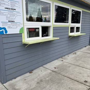 The Curb - The windows on the side of the house are where you order and pick up your food. - Sandwiches Near Me - Eagle Point, Oregon The Curb - The windows on the side of the house are where you order and pick up your food. - Sandwiches Near Me - Eagle Point, Oregon