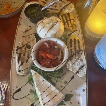 Cafe Gabbiano - Custom cheese board with Burrata and warm Brie, tomato and garlic and pesto - Italian Near Me - Sarasota, Florida Cafe Gabbiano - Custom cheese board with Burrata and warm Brie, tomato and garlic and pesto - Italian Near Me - Sarasota, Florida