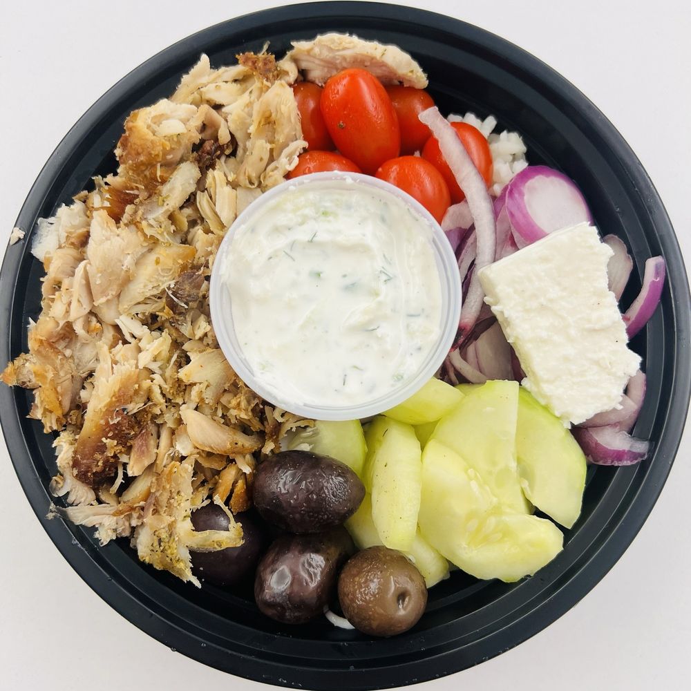 Chicken Gyro Bowl $14.95 Chicken gyro on a bed of rice with tomatoes, cucumbers, olives, onions, feta cheese, & El Greco sauce Chicken Gyro Bowl $14.95 Chicken gyro on a bed of rice with tomatoes, cucumbers, olives, onions, feta cheese, & El Greco sauce