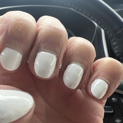 Nail Pro - Looks like a kindergartener painted my nails. Manicurist smelled like a clipped cigarette and kept yelling at me in a foreign language.