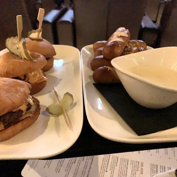 Reserve Kitchen & Bar - Bellevue Lincoln Square - Mini cheeseburger sliders and soft pretzels with white queso - Cinema Near Me - Bellevue, Washington Reserve Kitchen & Bar - Bellevue Lincoln Square - Mini cheeseburger sliders and soft pretzels with white queso - Cinema Near Me - Bellevue, Washington