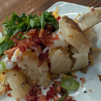 TWO60 Kitchen + Bar - 1/2 of hubby's loaded baked potato...I ate the other  1/2 (unloaded) - New American Near Me - Fairfield, California