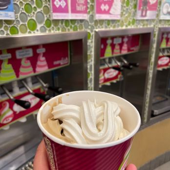 Menchie's Alamo Ranch - a hand holding a cup of ice cream - Ice Cream & Frozen Yogurt Near Me - San Antonio, Texas
