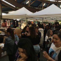 Bruno Mars 24Karat Magic Concert - The area where concert merchandise is being sold is under the round walkways at the SOUTH END ZONE!