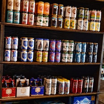 Firewater Liquor - a shelf full of beer cans - Beer, Wine & Spirits Near Me - Waco, Texas Firewater Liquor - a shelf full of beer cans - Beer, Wine & Spirits Near Me - Waco, Texas