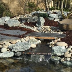 Young's Landscape Design - Flagstone Path over River & Pond