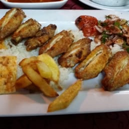 chicken wings Turkish style. that little veggie mixed with the rice was amazing! chicken wings Turkish style. that little veggie mixed with the rice was amazing!