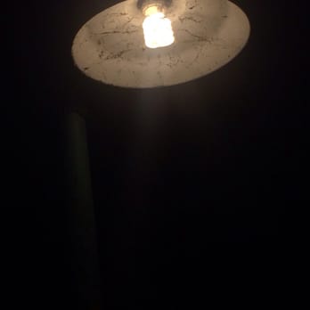 Sunset Grille & Raw Bar - Spider webs in a lamp directly outside of the restaurant - Sushi Bars Near Me - Duck, North Carolina Sunset Grille & Raw Bar - Spider webs in a lamp directly outside of the restaurant - Sushi Bars Near Me - Duck, North Carolina