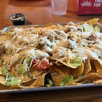 The Hangout Bar & Grill - Nachos with Chicken - Pizza Near Me - Brunswick, Georgia The Hangout Bar & Grill - Nachos with Chicken - Pizza Near Me - Brunswick, Georgia