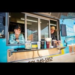 Chicos Chicken - The owners and a side view of the truck.