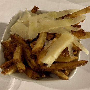 Sash - a bowl of french fries with cheese on top - Canadian (New) Near Me - Toronto, Ontario