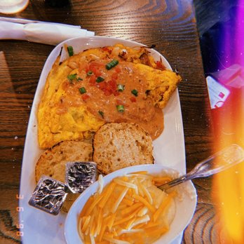 Another Broken Egg Cafe - Mardi Gras omelette - American Near Me - Jacksonville, Florida Another Broken Egg Cafe - Mardi Gras omelette - American Near Me - Jacksonville, Florida