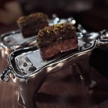 TBD - Kakuni Mochi Donut: Slow-braised pork belly, mochi donut, cured egg yolk ($10 each) - Izakaya Near Me - San Francisco, California