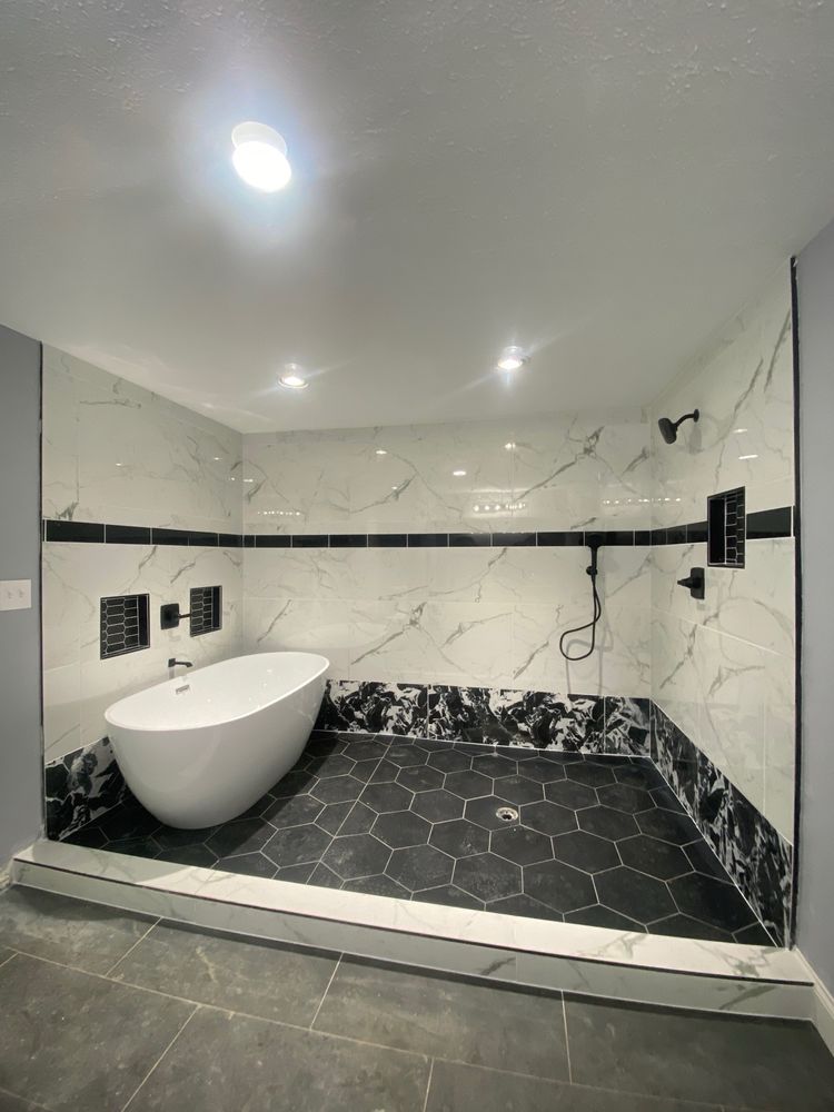 Slide of Anytime Renovations & Drain