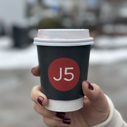 J5 Coffee - Peppermint mocha with oat milk and whip, whipped cream on top.