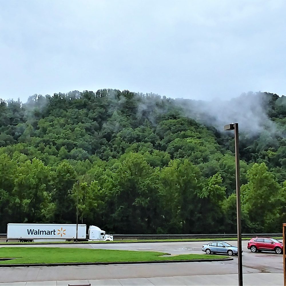 Tennessee Welcome Center - This is another view of the mountains (and low clouds) as seen from the welcome center.  Photo taken August 3, 2018. - Rest Stops Near Me - Hartford, Tennessee