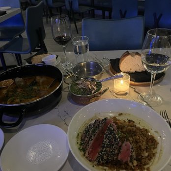 Salt Water Social - My honey's deeply flavorful cioppino and my sesame crusted seared tuna over crab fried rice...both winners! - Seafood Near Me - Denver, Colorado Salt Water Social - My honey's deeply flavorful cioppino and my sesame crusted seared tuna over crab fried rice...both winners! - Seafood Near Me - Denver, Colorado