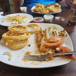 El Tropical Seafood - Pan grilled flounder. Served with side and trip to the salad bar