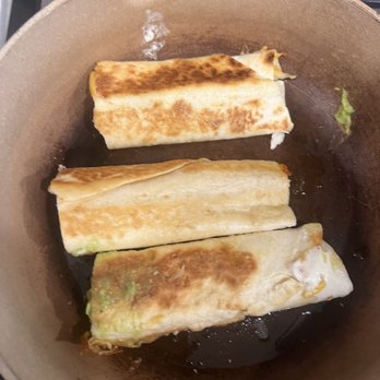 La Cabanita Mex 4 - This is suppose to be a chicken flauta. The brown marks are after I started frying them... - Mexican Near Me - Meridian, Idaho La Cabanita Mex 4 - This is suppose to be a chicken flauta. The brown marks are after I started frying them... - Mexican Near Me - Meridian, Idaho